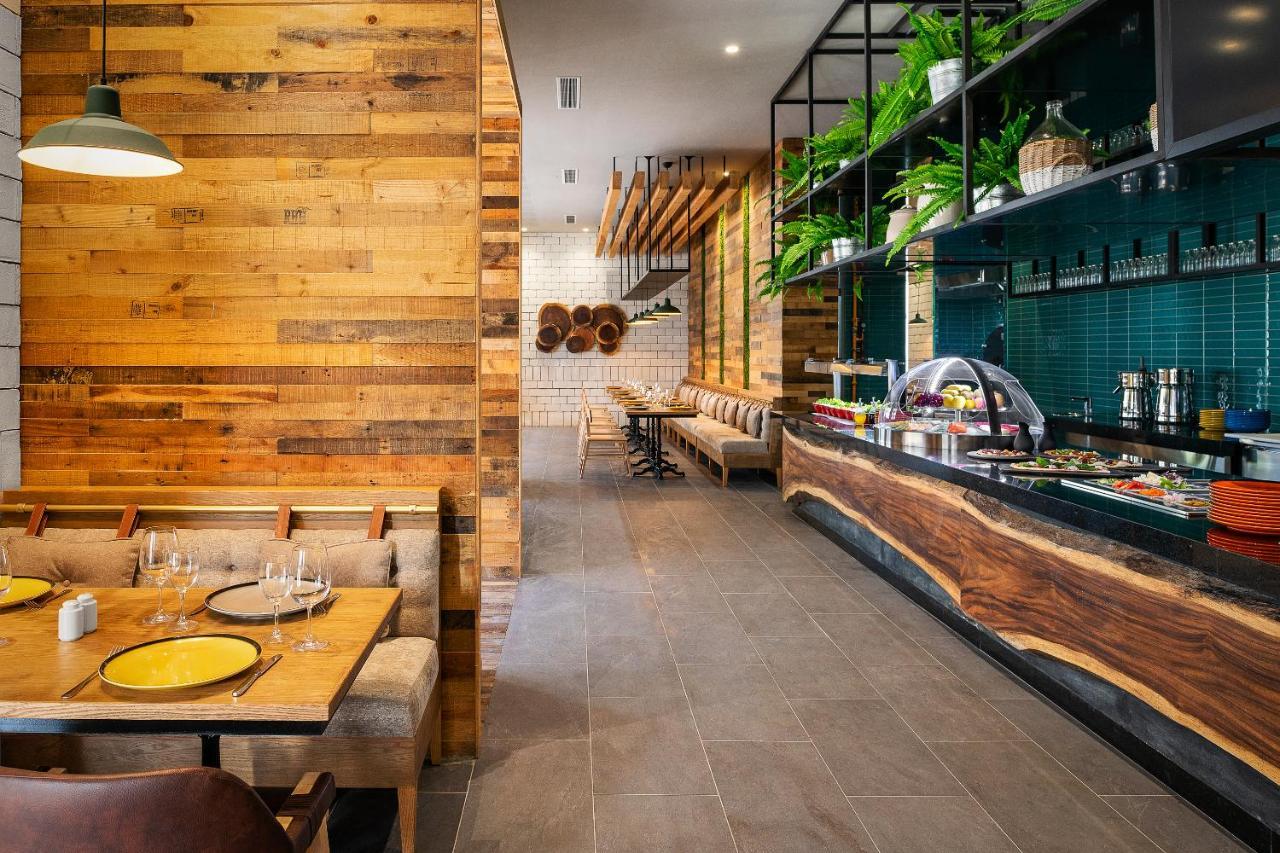 Catalonia Grand Costa Mujeres All Suites & Spa Cancun Exterior photo Interior of a restaurant in the United States