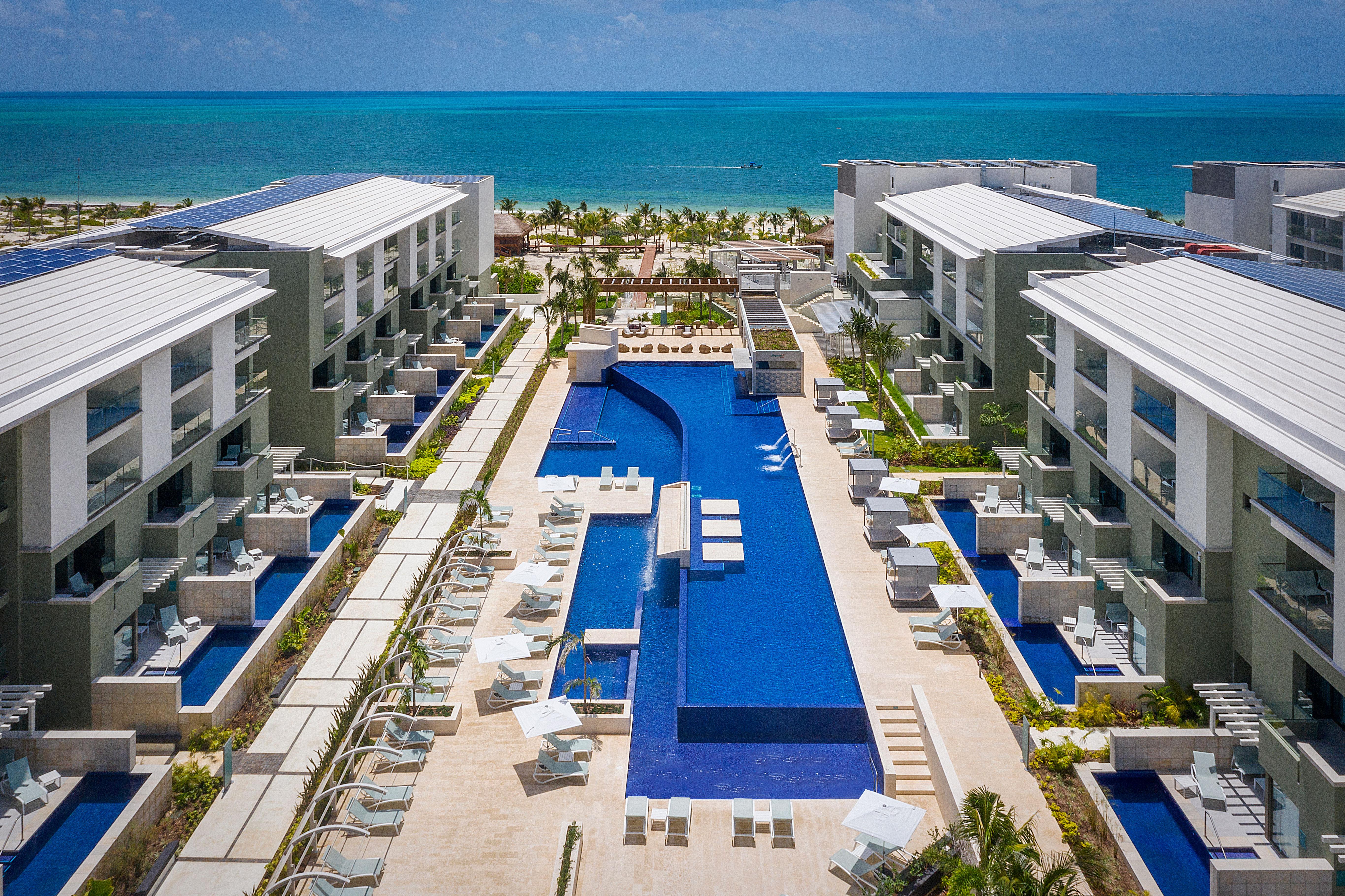 Catalonia Grand Costa Mujeres All Suites & Spa Cancun Exterior photo Aerial view of the resort