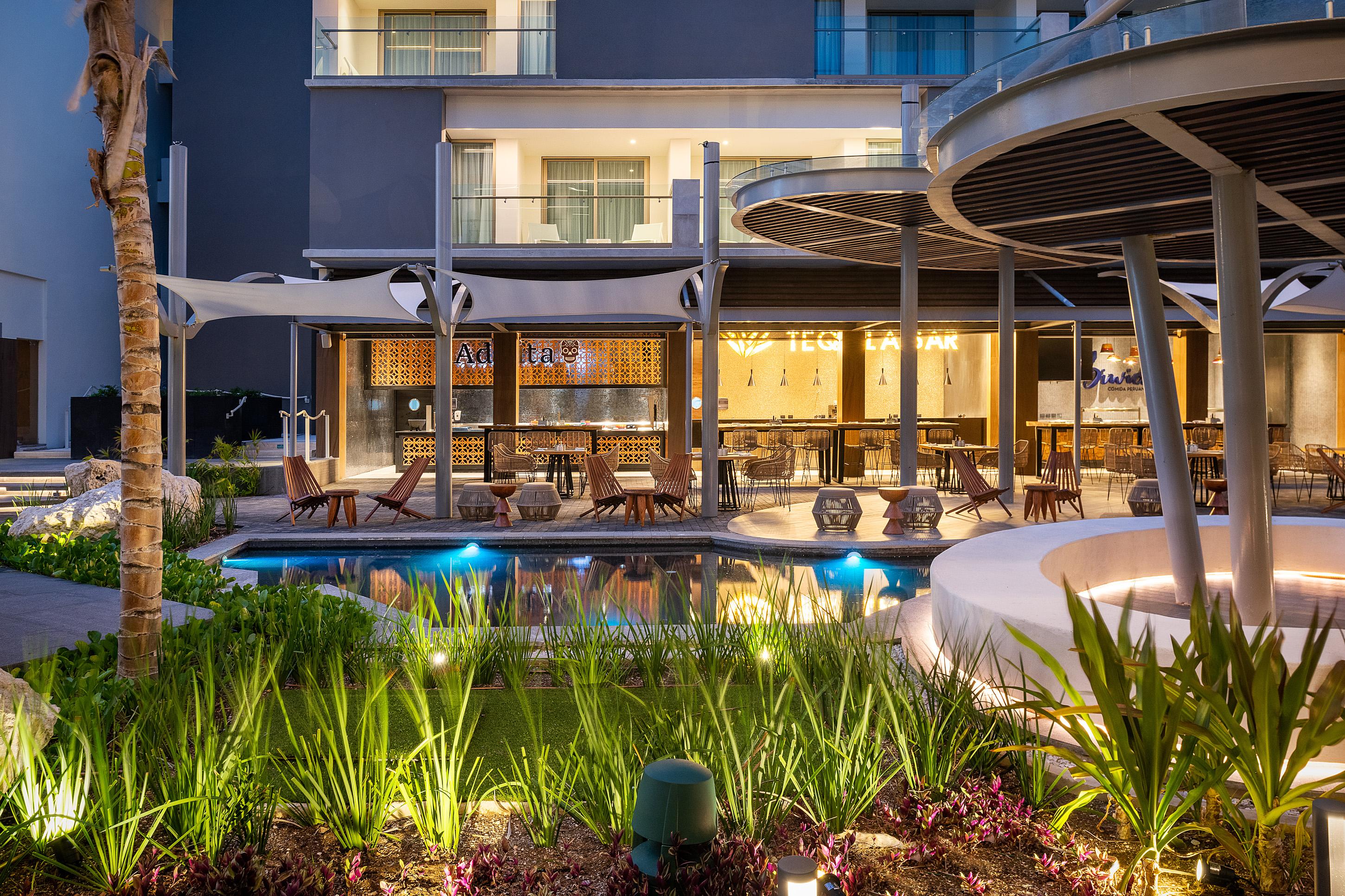 Catalonia Grand Costa Mujeres All Suites & Spa Cancun Exterior photo The pool at the hotel